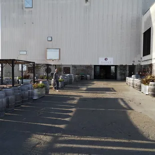 a man walking in front of a building