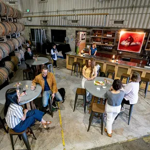 Surrounded by barrels in the winery hangar