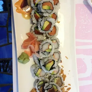 Maki trio lunch special: salmon roll, California roll, and tuna roll.  Great sushi special!