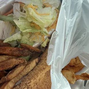 A glimpse into the to-go bag at the catfish &amp; Side Salad