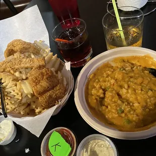 Catfish &amp; Waffle Fries with Crown &amp; Coke. Crawfish Étouffée with Woodford on the rocks!