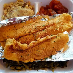 Wednesday special: mustard greens over rice, cornbread dressing, candied yams, and fried fish.