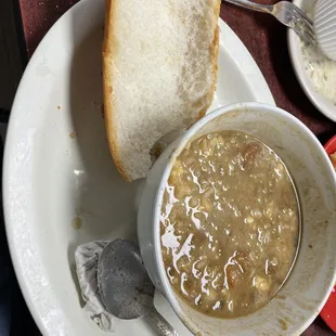 Seafood gumbo with potato salad.