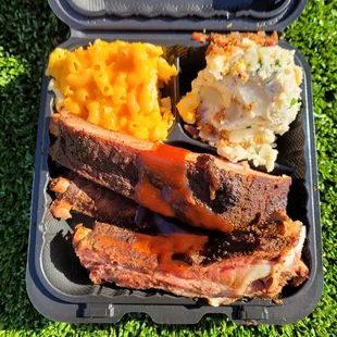 ribs with mac n' cheese and loaded potato salad
