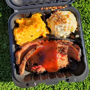 brisket with mac n' cheese and loaded potato salad