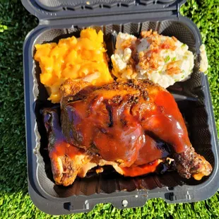 chicken with mac n' cheese and loaded potato salad