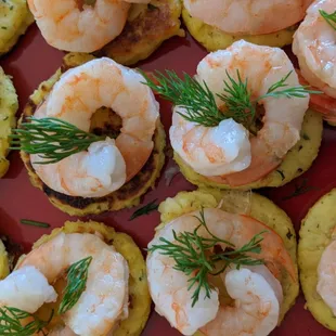Poached shrimp and herbed potato pancakes