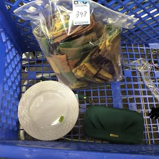 Napkins $3.98, small plate $.49, and wallet $6.98