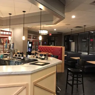 Inside bar area and booths on the side