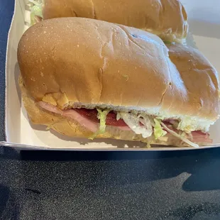 two sandwiches on a tray
