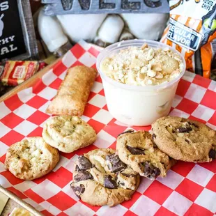 a tray of cookies and a cup of popcorn