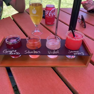 Wine Flight and hard cider in the back