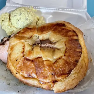 Smoked Turkey on croissant with a side of potato salad. Yum yum yum