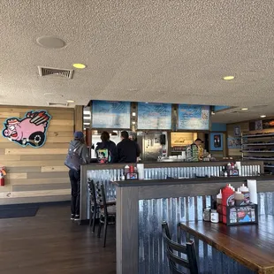Comfortable dining area with plenty of clean tables.