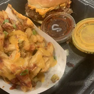 Spicy bbq sandwich with loaded bbq ranch fries and a sweet tea