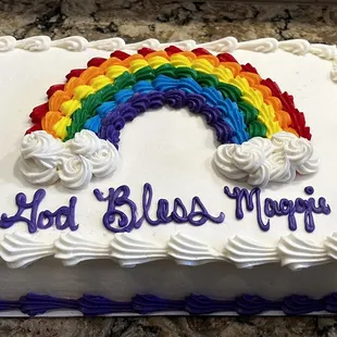 a cake with a rainbow on it