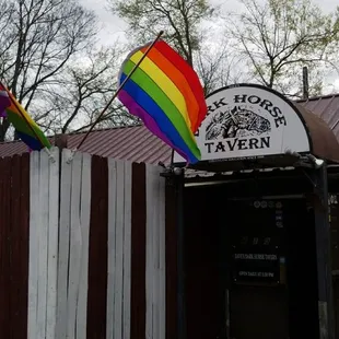 a rainbow flag on the roof