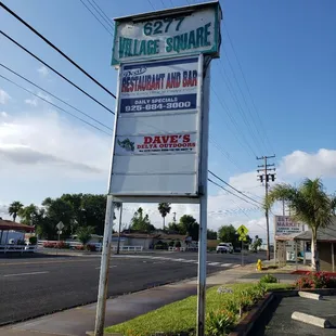 Sign on main board by the street