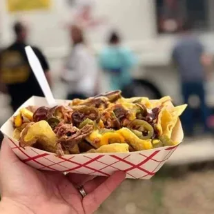 Pull pork and brisket nachos.