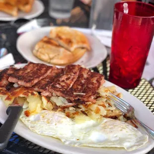 Breakfast special: Two eggs, American fries, corned beef hash and toast for $7.25.