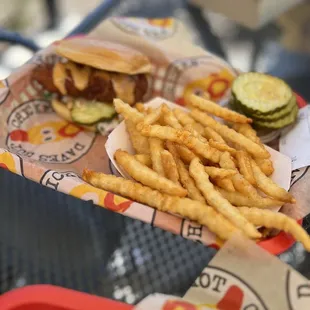 a basket of fries and a sandwich
