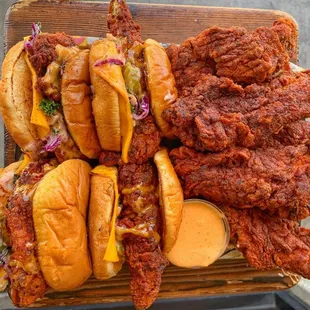 a pile of fried chicken sandwiches