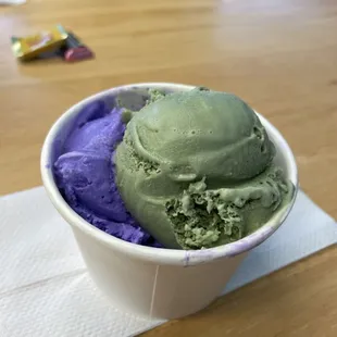 a bowl of green and purple ice cream