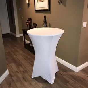Add a great look with a spandex table cover.