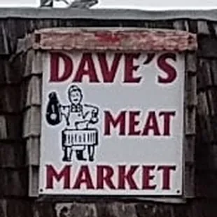 a sign for dave&apos;s meat market