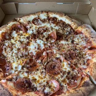 Large pepperoni and sausage pizza