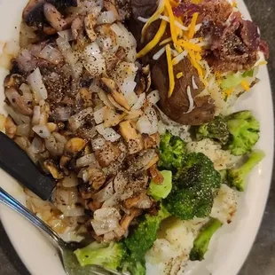 8oz Sirloin Steak, covered in sauteed mushrooms and onions. Load, baked potato and griddled vegetables.