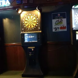 3 dart machines. The one on the right has a free sharks game :)