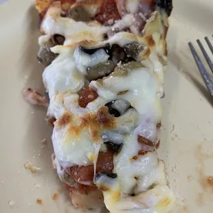 Deep dish... extra sauce, pepperoni, olives, mushrooms, and sausage