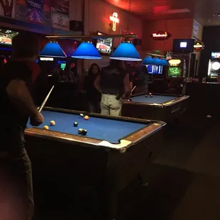 a man playing pool