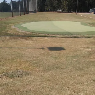 Free practice area for putting and chipping to green with bunker!