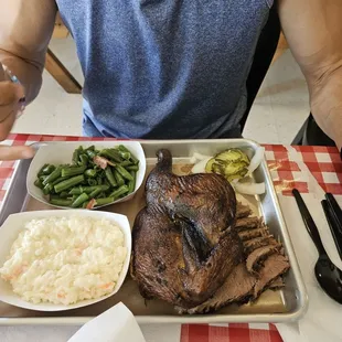 2 meat platter with chicken and brisket, with coleslaw and beans.