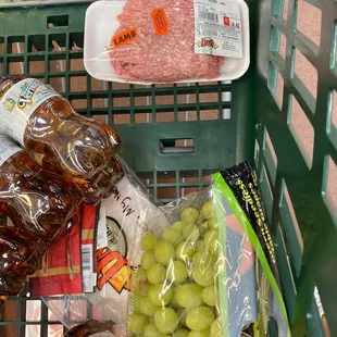 a grocery cart full of food