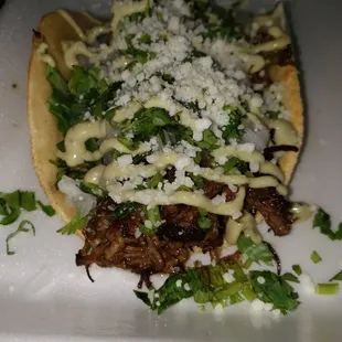 Smoked Brisket Taco on Corn Tortilla.