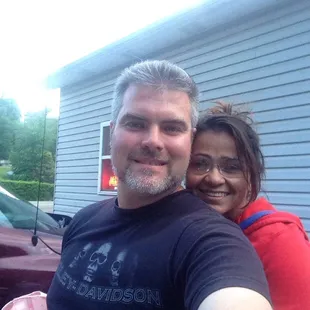 a man and woman taking a selfie