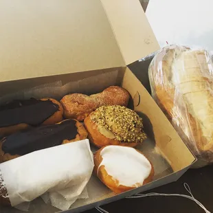 A variety of donuts and bread.