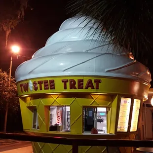 an ice cream shop at night