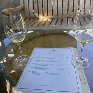 two glasses of wine on a table