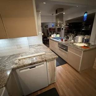 not painted, but the craftsmanship is sill evidence...did I mention we have an electric trash can you can use with your knee...