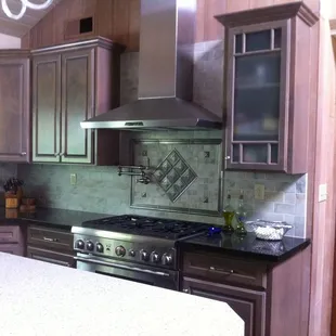 a kitchen with stainless steel appliances