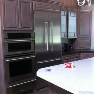a kitchen with stainless steel appliances
