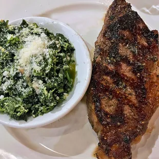 12-oz New York Strip and Italian spinach.