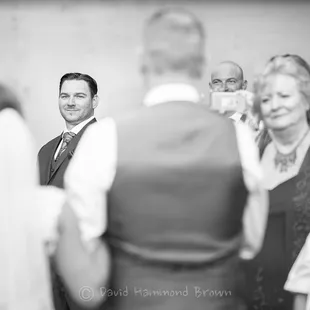 Groom seeing Bride walk down the aisle.