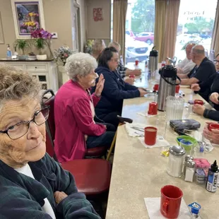 He has a menu of specials and also menu to look at.