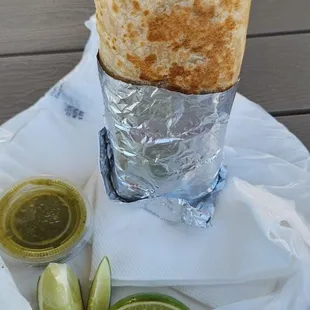 Nicely toasted Super Burrito.  Foil wrapped for easy munching.