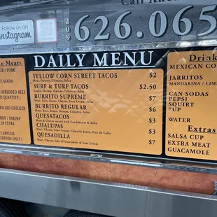 a menu on a food truck